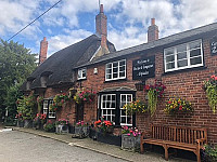 The Axe And Compasses outside