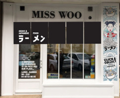 Miss Woo outside