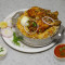 Chicken Double Joint Biryani Served With Raita And Salan (Serves 1)